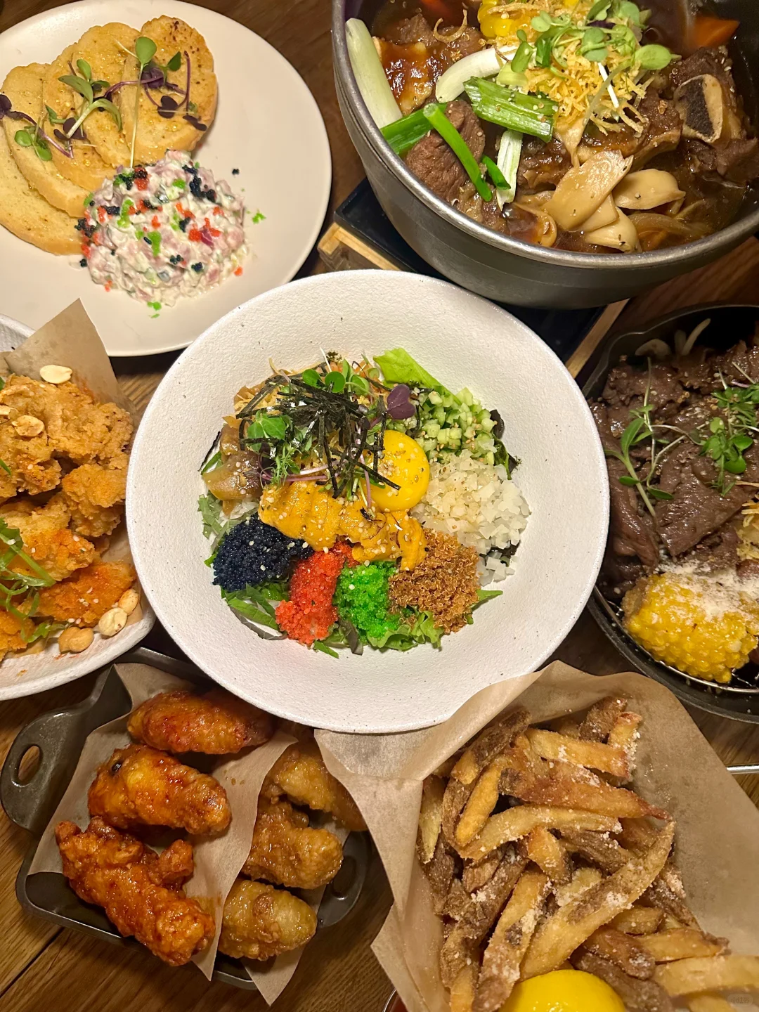 **Must-Try Japanese-Korean Eatery in NYC's K-Town: Sea Urchin and Raw Egg Yolk Rice Bowl 👍**